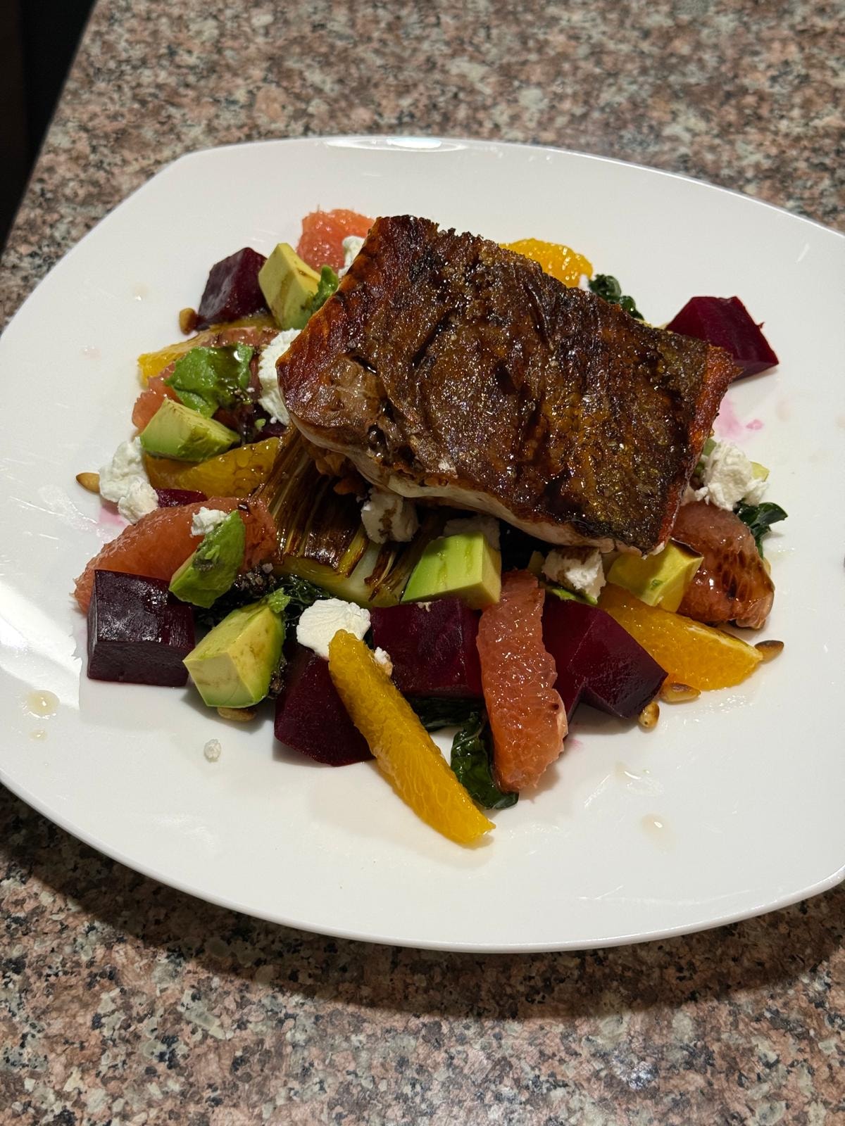 Seared salmon over beet avocado citrus salad — personal chef Tampa FL